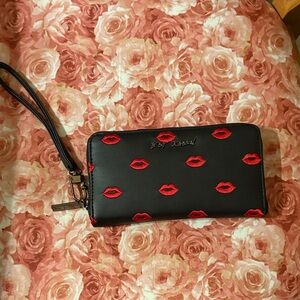 Betsey Johnson Black Wristlet with Red Lip Design